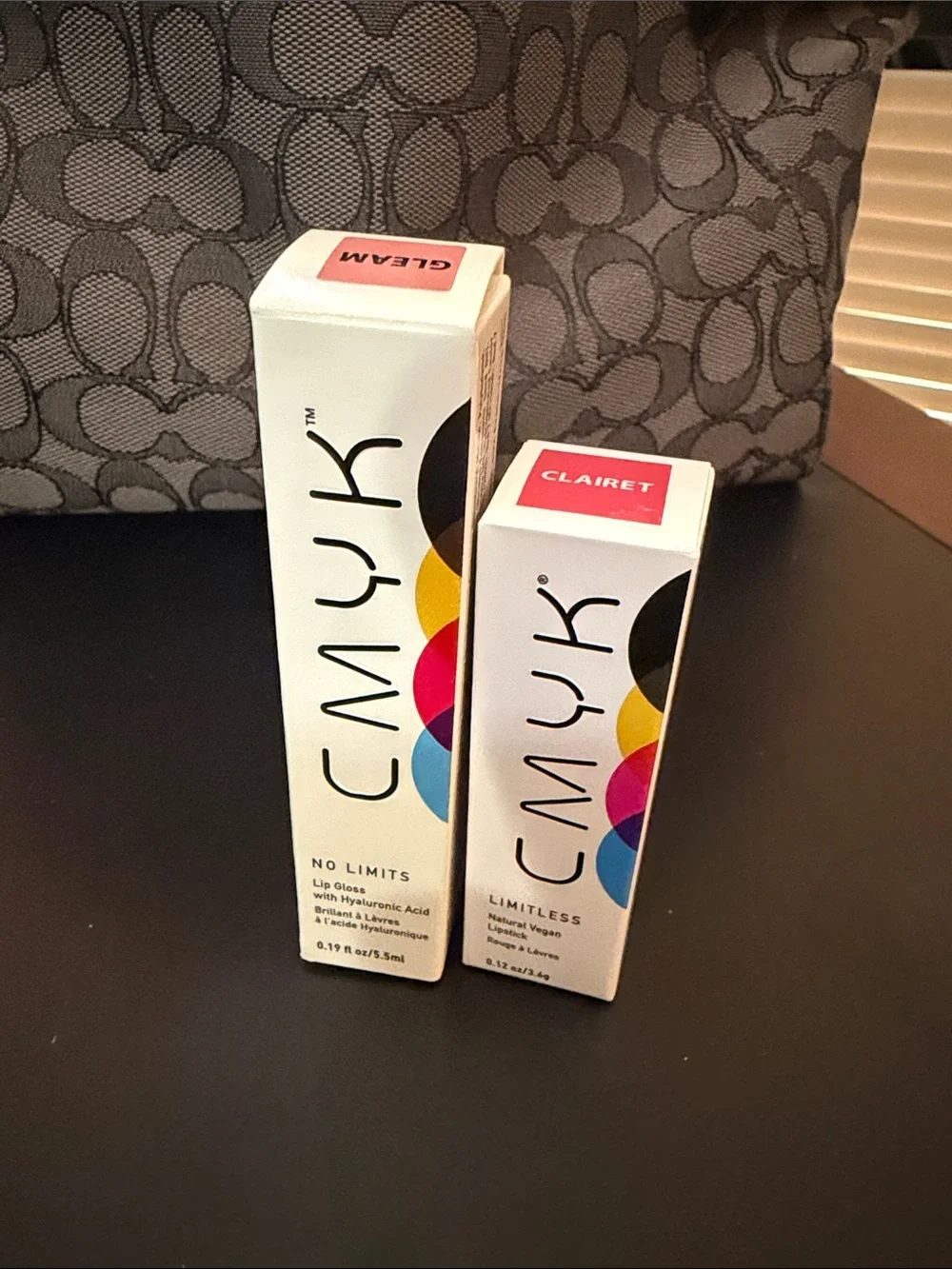 CMYK lip gloss and lipstick